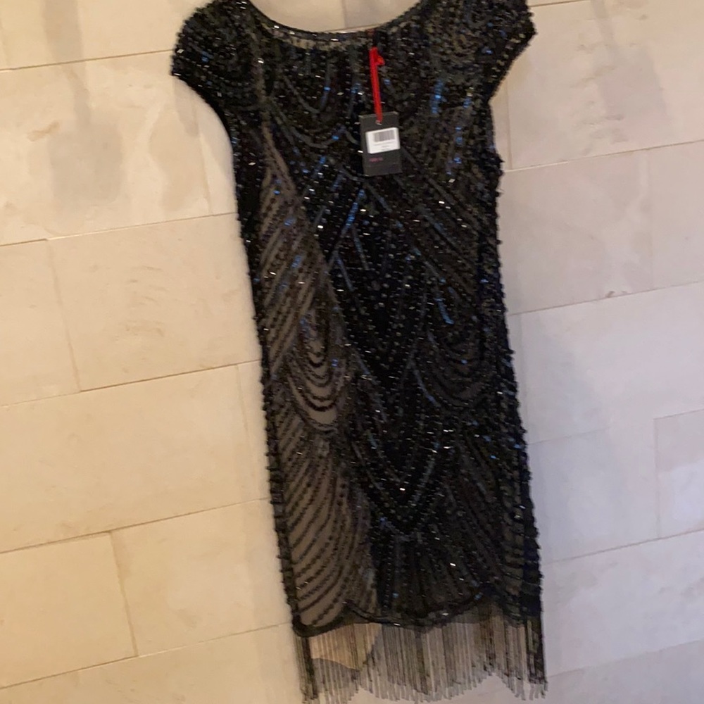 Black beaded dress/ see thru with nude color slip included-NWT